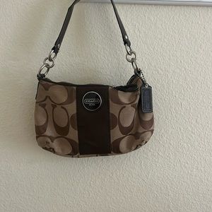 Brown and tan coach purse
